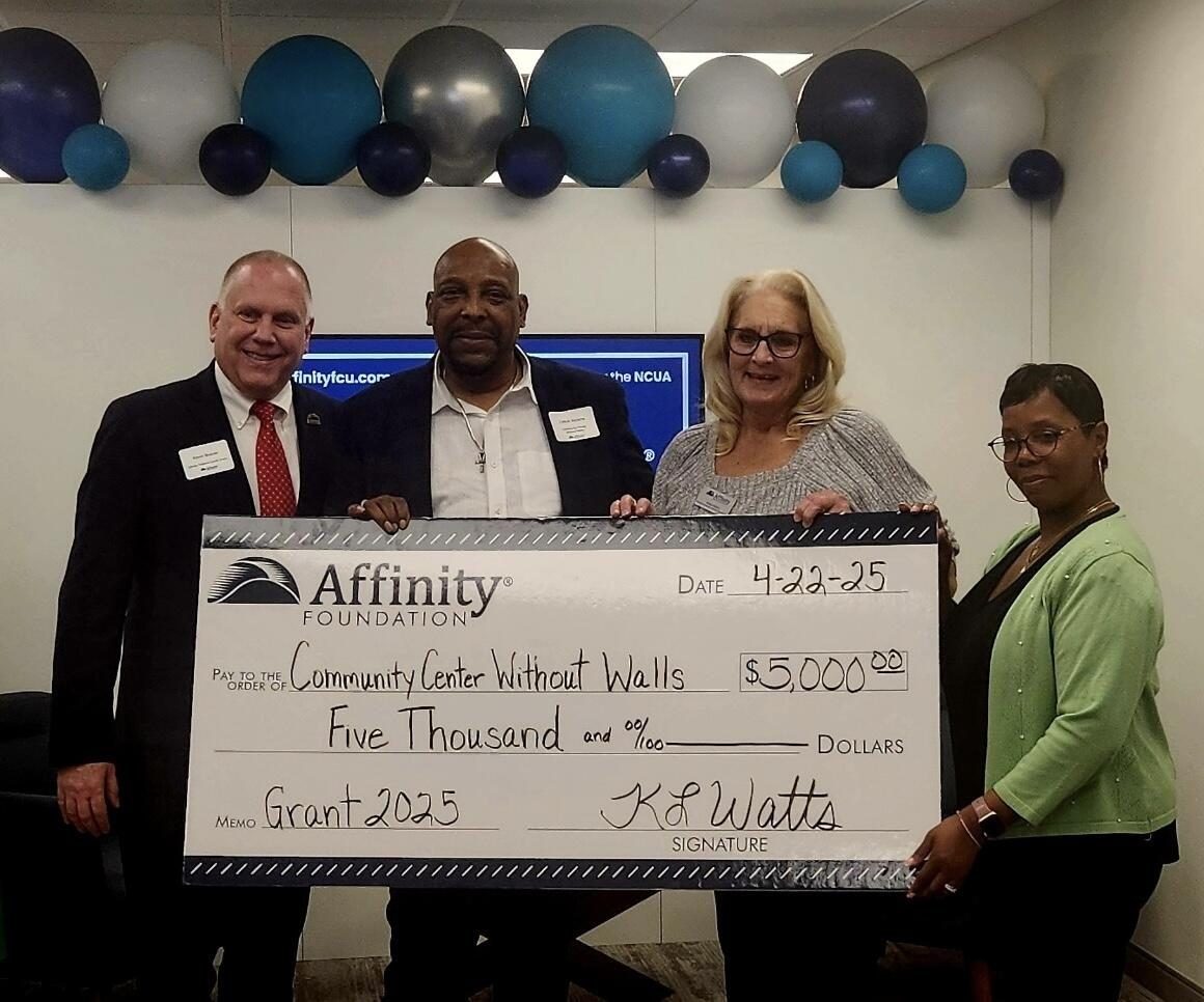 CCWW receiving a $5,000 grant check from the Affinity Foundation