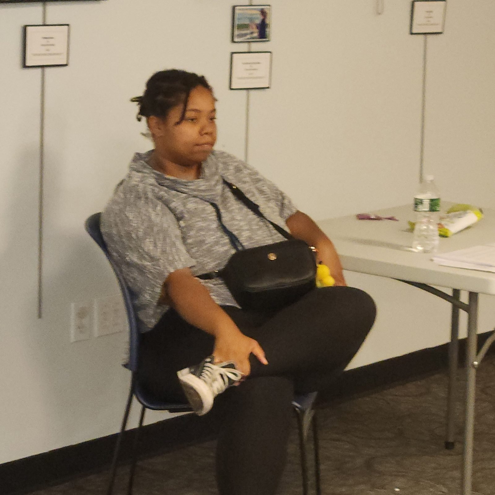 A CCWW participant seated during a session
